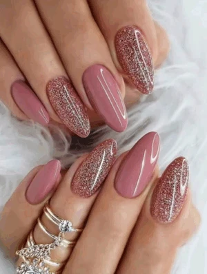 Artificial nails elevate your look with long almond pink nails