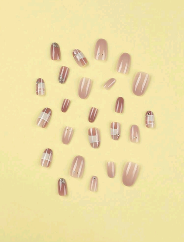 Artificial nails instantly upgrade your look with short oval rhinestone nails